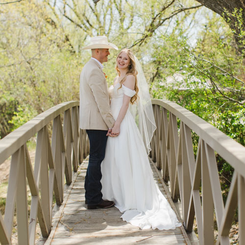 Cheyenne Wedding Bride and Groom on Bridge
